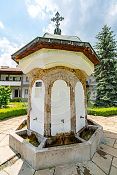 Fountain with natural mineral water in the Sokolin Monastery in Bulgaria