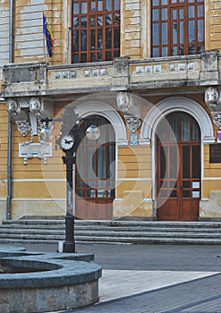 Fountain near an old clock