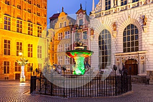 Fountain of Neptune in Gdansk at night, Poland