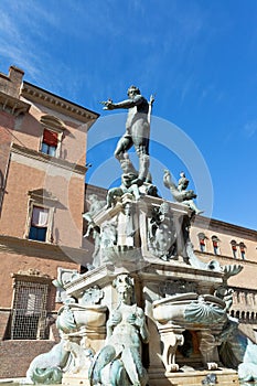 Fountain of Neptune on Piazza del Nettuno in Bologna in sunny da