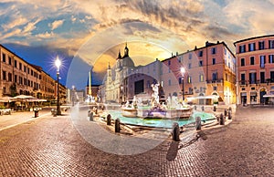 Fountain of Neptune in Piazza Navona at sunset, Rome, Italy