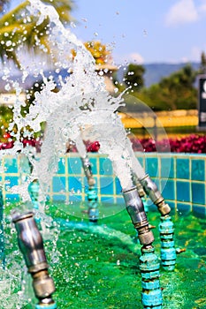Fountain nozzles spraying water.
