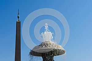 Fountain and obelisk in St Peter square in Rome, Italy