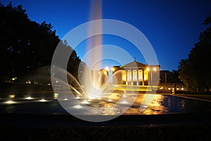 Fountain before opera house in Poznan at night