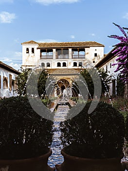 Fountain in the Patio de la Acequia in the Generalife gardens of the Alhambra palace in Granada, Andalusia, Spain