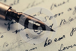 Fountain pen on an ancient handwritten letter. Old story. Retro style