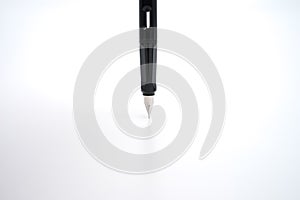 Fountain pen placed on the white paper opaque. Communication to business transactions, education, work, suitable as a background