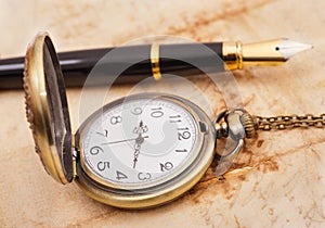 Fountain pen and pocketwatch