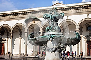 The fountain on Piazza Santissima Annunziata in Florence photo
