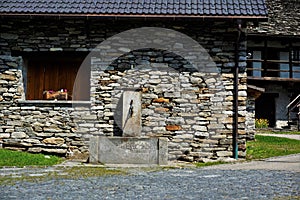 Fountain in the picturesque village center of Frasco, Verzasca Valley