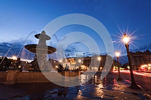 Fountain on Place de la Concorde in Paris France at night