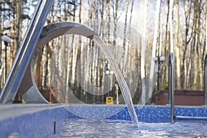 Fountain in the pool close up background