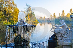 Fountain and sculpture by the Serpentine Lake at Hyde Park