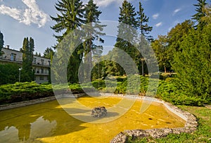 Fountain in small lake in the park in Sliac spa resort