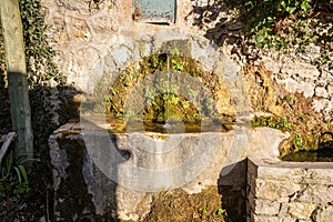 A fountain in the small town of Mazaugues in the Var department, in France
