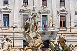 The fountain on the square Archimedes in Siracusa. In the center