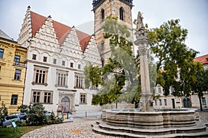 Fountain with a statue of St. Josefa at Charles Square near gothic and renaissance New Town Hall Novomestska radnice in the photo