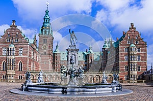Fountain with statues in front of Frederiksborg Palace, Denmark