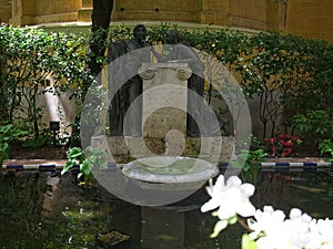 Fountain, statues, and the pool of the garden at Sorolla Museum photo