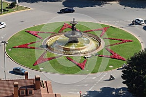 Fountain of the Three Graces in a roundabout next to Pier 1 in Malaga, Spain photo