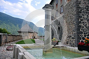 A fountain and tower of Castel thun, one of the most beautiful medieval castles of Italy in the Autonomous Province of Trento.