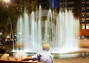 Fountain at town square in night. Sant Adria de Besos photo