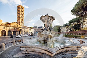 Fountain of the Tritons and Church of Santa Maria in Cosmedin in Rome