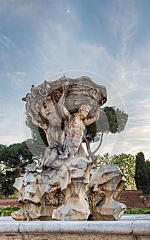 Fountain of tritons in Rome, Italy. Sunset light