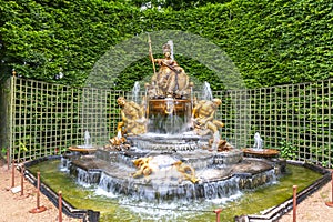 Fountain of Triumphant France Le Bosquet de l`Arc de Triomphe in Versailles gardens, Paris, France