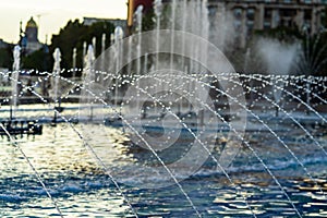 Fountain at Unirii Square in downtown of Bucharest.  Unirii Boulevard in Bucharest, Romania, 2021