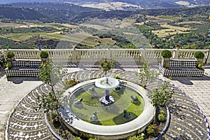 Fountain with views of the Sierra de las Nieves Natural Park from the Genal Valley. Serrania de Ronda, Andalusia, Spain