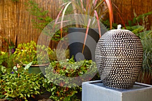 Fountain water feature in a garden yard