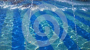 Fountain with water jets in arched form