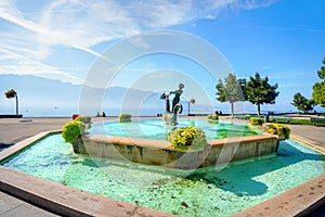 Fountain on waterside in Vevey town. Lake Geneva, Switzerland