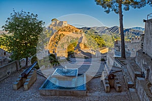 Fountain in Xativa Castle of Spain at Sunset photo