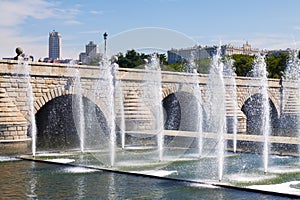 Fountains and bridge over Manzanares river in Madrid