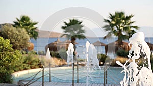 Fountains inside Swimming Pool and Sea