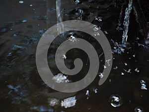 Fountains and rocks in the backyard pond