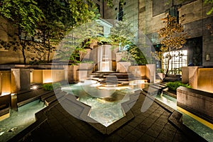 Fountains at Thomas Polk Park at night, in Uptown Charlotte, Nor