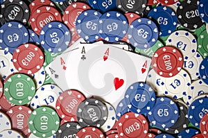 Four aces on casino chips
