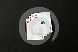 four aces , four of a kind aces poker black background