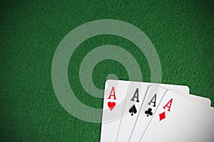 Four aces on green background. Gambling poker