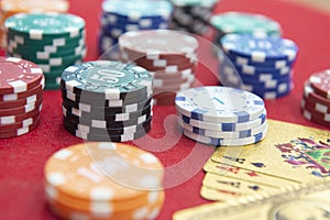 Four aces near stacks of chips on a red felt table