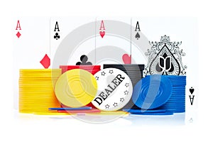 Four aces, poker chips and dealer button