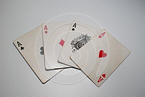 Four aces on a table. Poker winning hand.