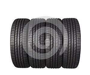 Four automobile black rubber tires isolated on white