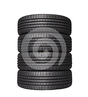 Four automobile black rubber tires on white