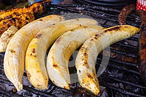 Four bananas on the grill, grilled bananas