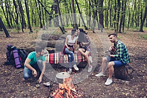 Four best friends are camping, girls are gossipping, boyfriends photo