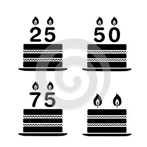 Four black aniversary cakes on a white background